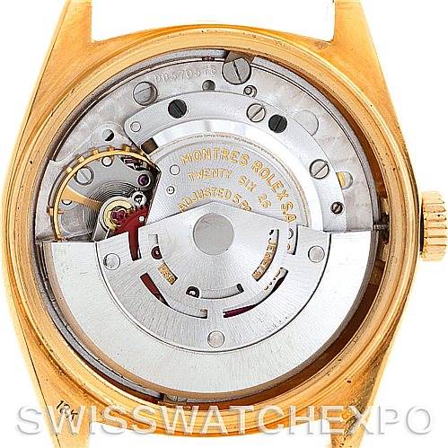 The image shows the interior components and movement mechanism of a Rolex President 1803 Men
s Yellow Gold Champagne Dial 1803 Men
s Yellow Gold Champagne Dial model watch.
