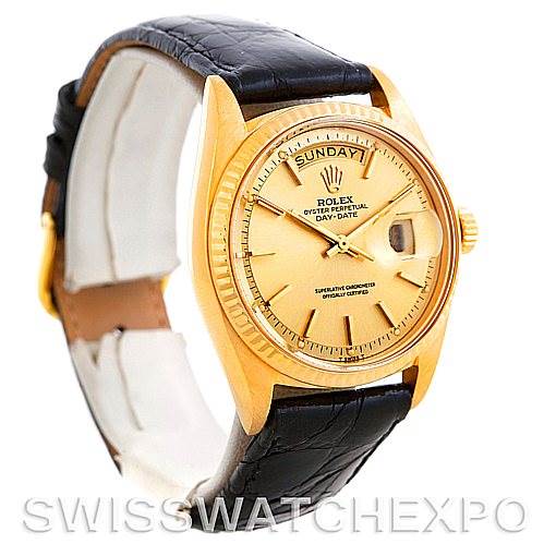 The image shows a Rolex President 1803 Men
s Yellow Gold Champagne Dial 1803 Men
s Yellow Gold Champagne Dial model watch at a three-quarter angle, highlighting its dial, bezel, and leather strap.