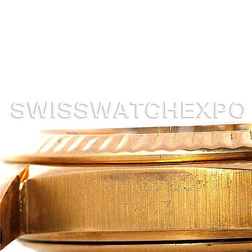 This image shows a close-up angle of the side of a Rolex President 1803 Men
s Yellow Gold Champagne Dial 1803 Men
s Yellow Gold Champagne Dial model, focusing on the case and part of the bezel.