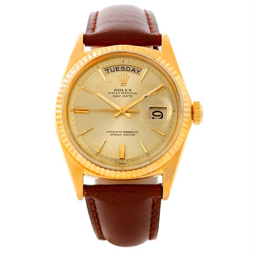 This image shows a front view of a Rolex President 1803 Men
s Yellow Gold Champagne Dial 1803 Men
s Yellow Gold Champagne Dial watch featuring a gold case, beige dial, and brown leather strap.