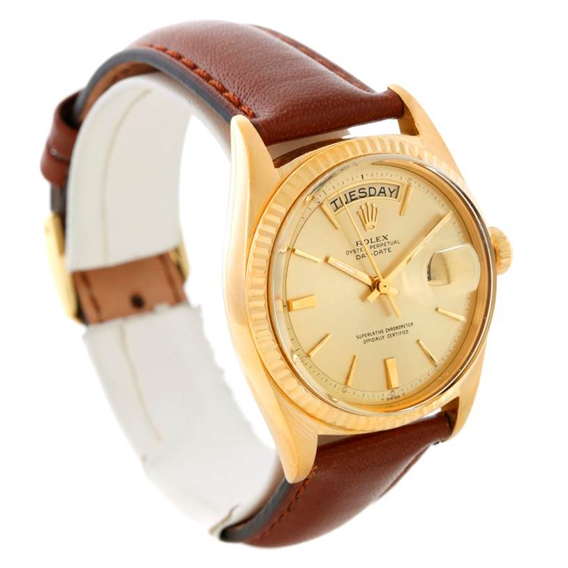 This image shows a Rolex President 1803 Men
s Yellow Gold Champagne Dial 1803 Men
s Yellow Gold Champagne Dial model watch angled slightly from the front, emphasizing its face, bezel, and brown leather strap.