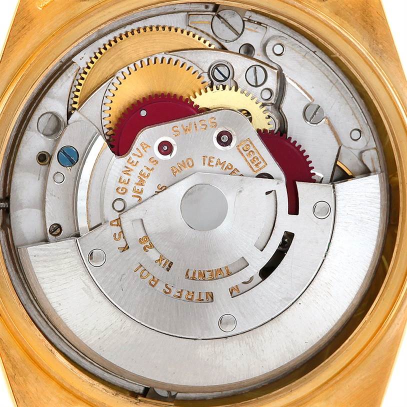 The image shows the internal mechanism and gears of a Rolex President 1803 Men
s Yellow Gold Champagne Dial 1803 Men
s Yellow Gold Champagne Dial model watch from a back angle.