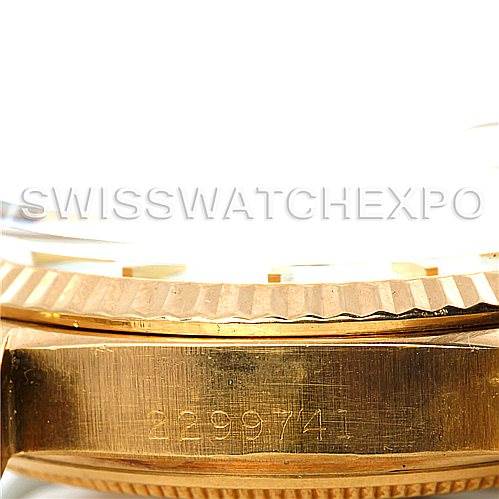 The image shows a close-up of the case
s side and bezel of a Rolex President 1803 Men
s Yellow Gold White Dial 1803 Men
s Yellow Gold White Dial model watch.