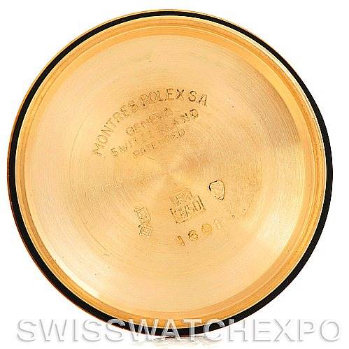 This image shows the inside of the case back of a Rolex President 1601 Men
s Yellow Gold Silver Dial 1601 Men
s Yellow Gold Silver Dial model watch.
