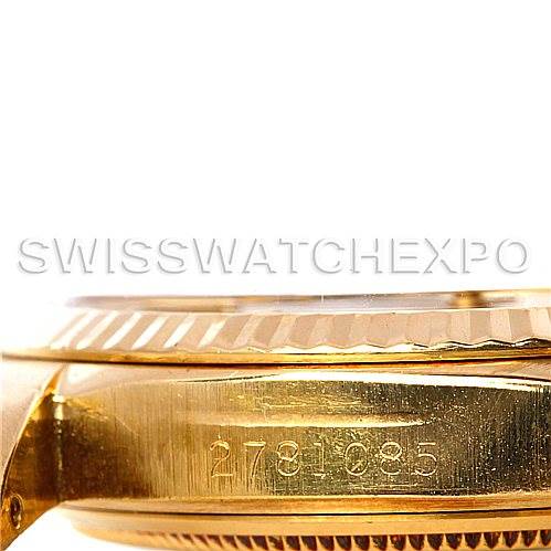 This image shows a close-up side view of the Rolex President 1601 Men
s Yellow Gold Silver Dial 1601 Men
s Yellow Gold Silver Dial model, displaying part of the case and visible serial number.
