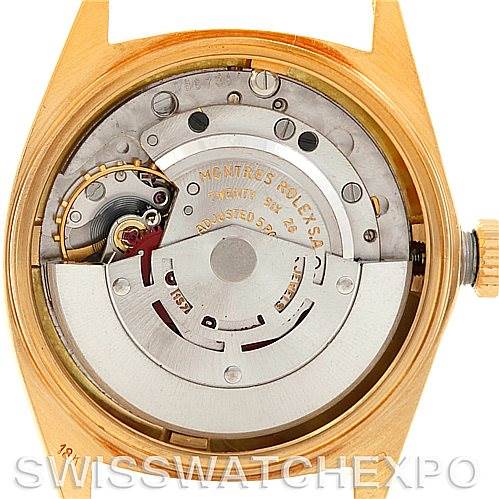 The image shows the movement and internal mechanisms of a Rolex President 1601 Men
s Yellow Gold Silver Dial 1601 Men
s Yellow Gold Silver Dial model watch viewed from the back.