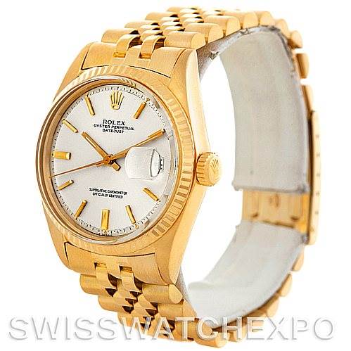 The image shows a side angle of the Rolex President 1601 Men
s Yellow Gold Silver Dial 1601 Men
s Yellow Gold Silver Dial model watch, highlighting its gold case, bracelet, and white dial with gold hour markers.