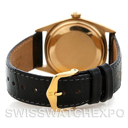 The image shows the back, clasp, and leather strap of a Rolex President 1803 Men's Yellow Gold Black Dial 1803 Men's Yellow Gold Black Dial model watch.