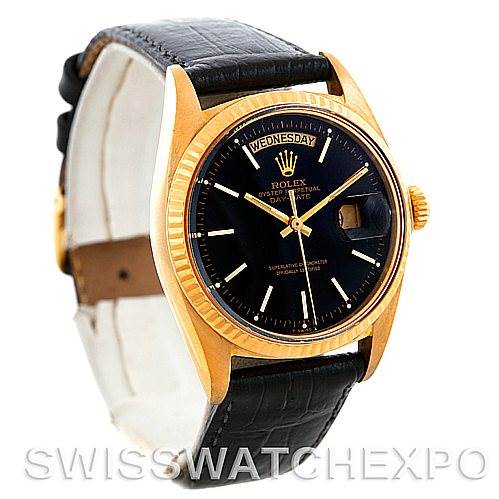 This image shows the Rolex President 1803 Men's Yellow Gold Black Dial 1803 Men's Yellow Gold Black Dial model watch at a slight angle, highlighting the black dial, gold casing, and leather strap.