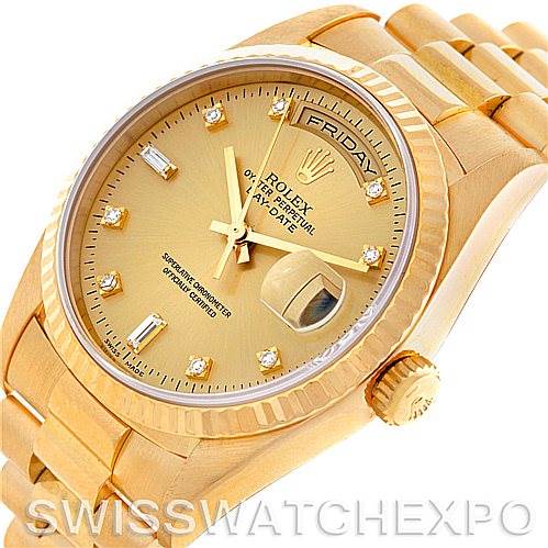 This image shows a tilted, close-up angle of a Rolex President 18238 Men
s Yellow Gold Champagne Dial 18238 Men
s Yellow Gold Champagne Dial model watch, featuring its face, crown, and bracelet.