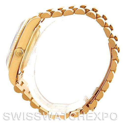 The image shows a side view of a Rolex President 18238 Men
s Yellow Gold Champagne Dial 18238 Men
s Yellow Gold Champagne Dial model watch, highlighting its case, crown, and bracelet.