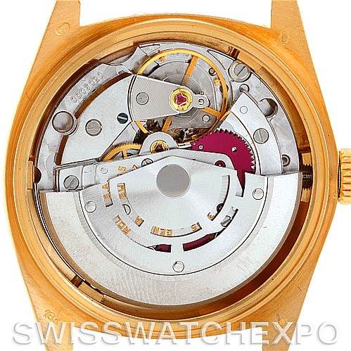 The image shows the internal movement mechanism of a Rolex President 16018 Men
s Yellow Gold Silver Dial 16018 Men
s Yellow Gold Silver Dial model watch, viewed from the back.