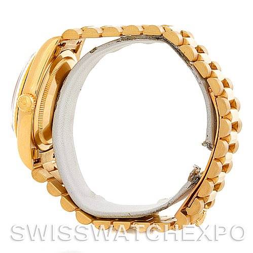 The image shows a side view of the Rolex President 18238 Men
s Yellow Gold Champagne Dial 18238 Men
s Yellow Gold Champagne Dial model, highlighting the bracelet and part of the watch case and crown.