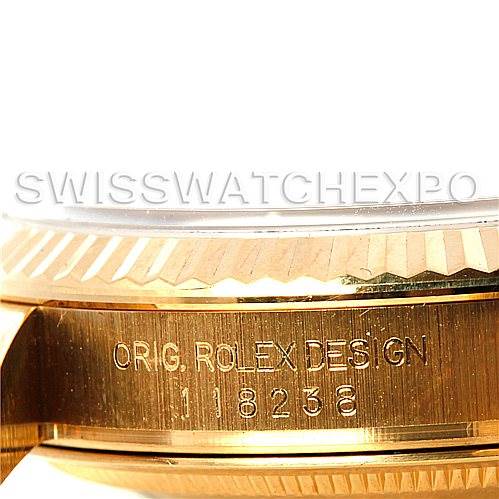The image shows a close-up of the side view of the Rolex President 118238 Men's Yellow Gold White Dial 118238 Men's Yellow Gold White Dial watch, focusing on the engraved model number and "ORIG. ROLEX DESIGN".