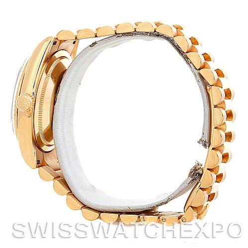 This image shows a side view of the Rolex President 118238 Men's Yellow Gold White Dial 118238 Men's Yellow Gold White Dial model watch, highlighting its gold case and band.