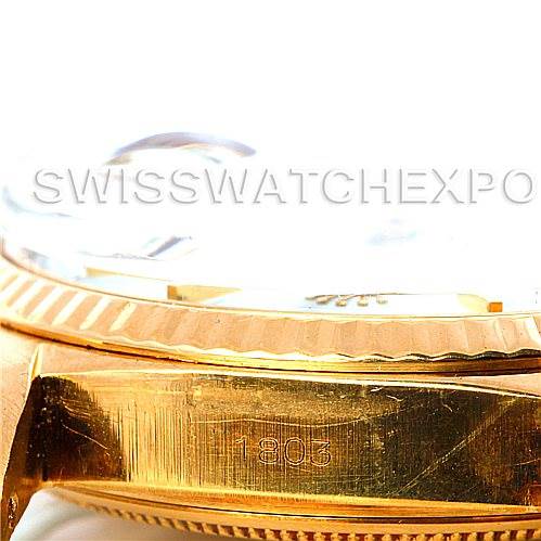 This close-up image shows the side view of a Rolex President 1803 Men's Yellow Gold White Dial 1803 Men's Yellow Gold White Dial model watch, highlighting the case and bezel with the model number 1803 engraved.