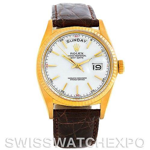 The image shows a frontal view of a Rolex President 1803 Men's Yellow Gold White Dial 1803 Men's Yellow Gold White Dial Day-Date watch with gold case, white dial, and leather strap.