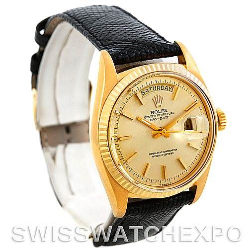 This Rolex President 1803 Men
s Yellow Gold Champagne Dial 1803 Men
s Yellow Gold Champagne Dial model watch is shown at a 3/4 angle, highlighting its gold case, face, and black leather strap.