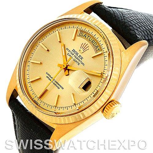 This image shows a close-up, angled view of the Rolex President 1803 Men
s Yellow Gold Champagne Dial 1803 Men
s Yellow Gold Champagne Dial watch, showcasing its dial, bezel, and black leather strap.