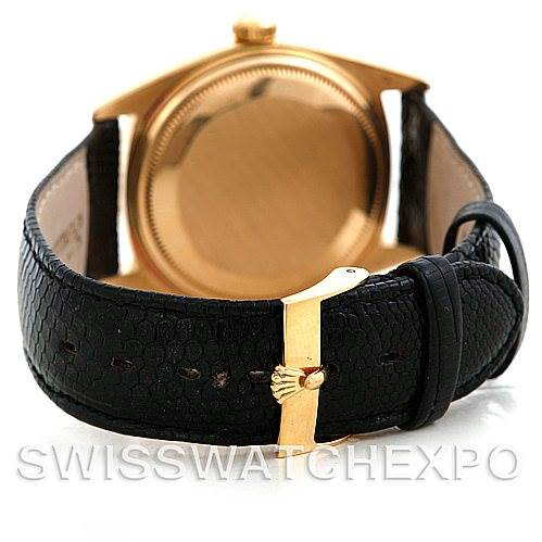 This image shows the back case and leather strap with a gold buckle of the Rolex President 1803 Men
s Yellow Gold Champagne Dial 1803 Men
s Yellow Gold Champagne Dial model watch.