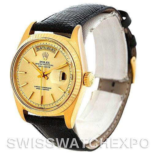This Rolex President 1803 Men
s Yellow Gold Champagne Dial 1803 Men
s Yellow Gold Champagne Dial model watch is shown from a front and slightly right angle, highlighting the gold case, day-date display, and black leather strap.