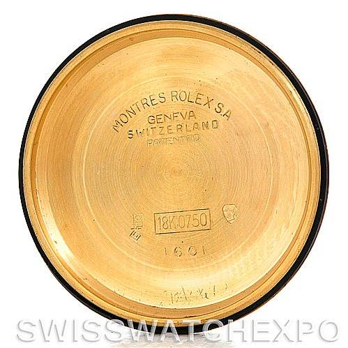 The image shows the interior case back of a Rolex President 1601 Men's Yellow Gold Black Dial 1601 Men's Yellow Gold Black Dial watch, highlighting the engraving and material.