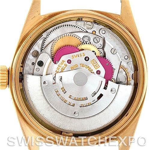 This image shows the open case back of a Rolex President 1601 Men's Yellow Gold Black Dial 1601 Men's Yellow Gold Black Dial model, revealing its intricate internal movement.