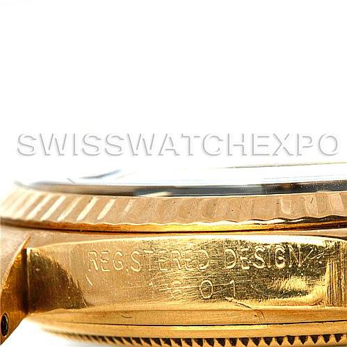 This image shows a close-up of the side and bezel of a Rolex President 1601 Men's Yellow Gold Black Dial 1601 Men's Yellow Gold Black Dial model watch.