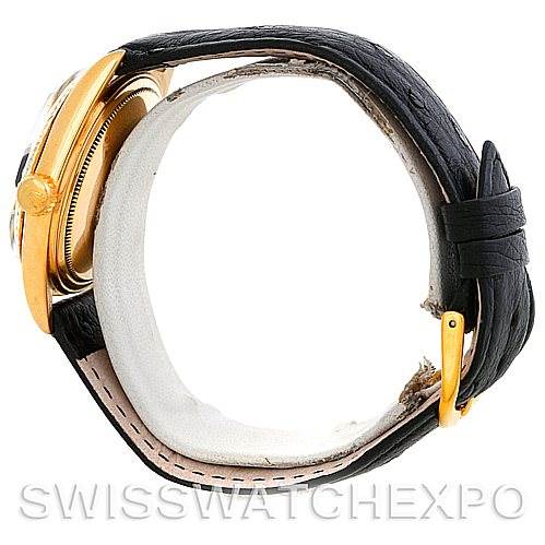 The image shows a side view of the Rolex President 1601 Men's Yellow Gold Black Dial 1601 Men's Yellow Gold Black Dial model watch, focusing on the case and leather strap.