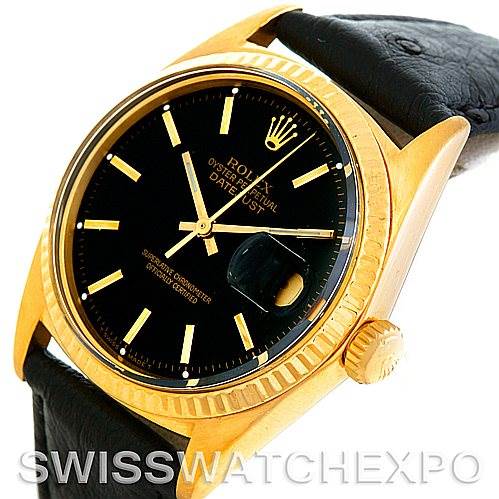 This image shows a close-up angled view of the Rolex President 1601 Men's Yellow Gold Black Dial 1601 Men's Yellow Gold Black Dial model watch, highlighting its black dial, gold case, crown, and black leather strap.