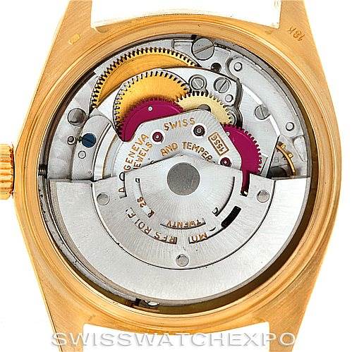 This image shows the back view of a Rolex President 1803 Men's Yellow Gold Black Dial 1803 Men's Yellow Gold Black Dial model watch, displaying its intricate movement and inner mechanisms.