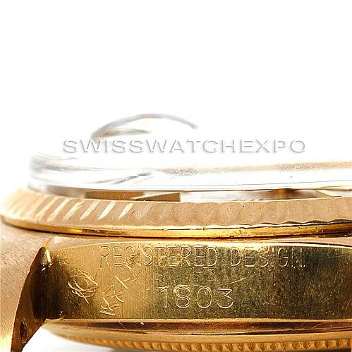 This image shows a close-up side view of the Rolex President 1803 Men
s Yellow Gold Champagne Dial 1803 Men
s Yellow Gold Champagne Dial model, focusing on the case and bezel with the model number 1803 engraved.