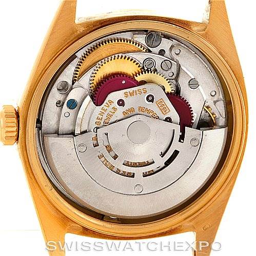 This image shows the internal mechanism and movement of a Rolex President 1803 Men
s Yellow Gold Champagne Dial 1803 Men
s Yellow Gold Champagne Dial model watch, viewed from the back.