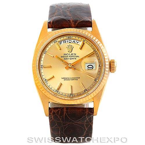 This image shows a front view of a Rolex President 1803 Men
s Yellow Gold Champagne Dial 1803 Men
s Yellow Gold Champagne Dial watch with a gold face, leather strap, and date display.