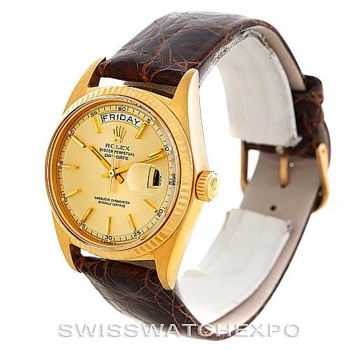 The image shows a Rolex President 1803 Men
s Yellow Gold Champagne Dial 1803 Men
s Yellow Gold Champagne Dial watch angled to display the face, bezel, crown, and leather strap.