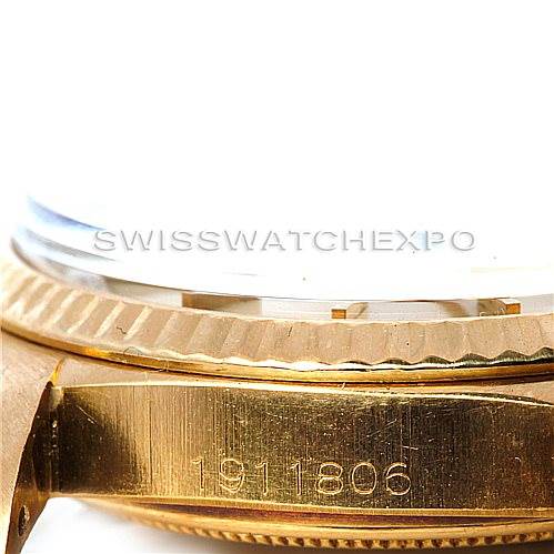 The image shows a close-up side angle of the case and bezel of a Rolex President 1803 Men
s Yellow Gold Champagne Dial 1803 Men
s Yellow Gold Champagne Dial model watch, including the serial number engraved on the lug.