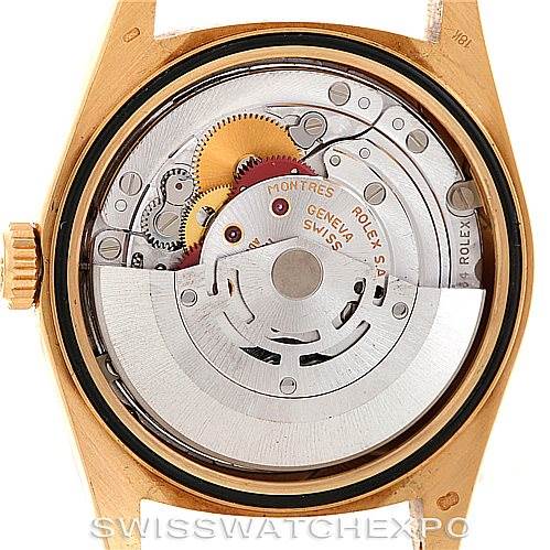 This image shows the back view of the Rolex President 18238 Men's Yellow Gold Beige Dial 18238 Men's Yellow Gold Beige Dial model watch, revealing its inner mechanical movement.