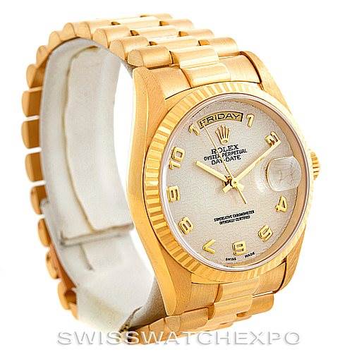 The Rolex President 18238 Men's Yellow Gold Beige Dial 18238 Men's Yellow Gold Beige Dial watch is shown at a three-quarter angle, highlighting its gold bracelet, case, and dial.