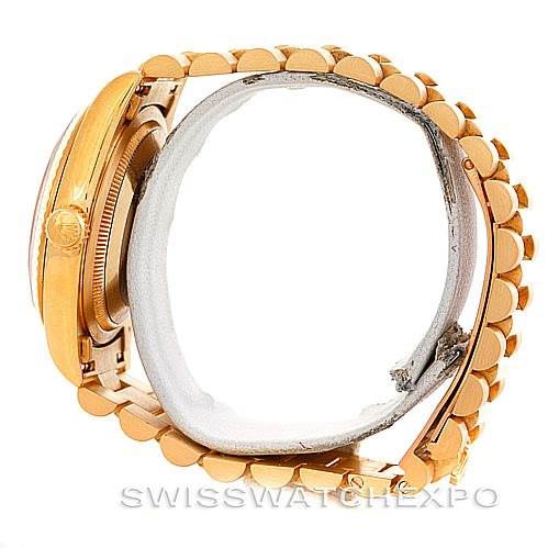 This image shows a side view of the Rolex President 18238 Men's Yellow Gold Beige Dial 18238 Men's Yellow Gold Beige Dial model watch, highlighting the case, crown, and bracelet.