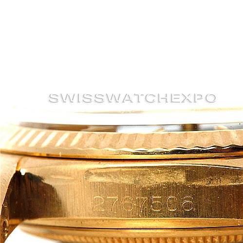 The image shows a close-up of the side of the Rolex President 1803 Men's Yellow Gold Grey Dial 1803 Men's Yellow Gold Grey Dial model, highlighting the serial number and part of the bezel.