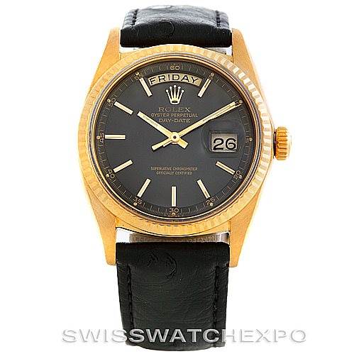 This image shows a Rolex President 1803 Men's Yellow Gold Grey Dial 1803 Men's Yellow Gold Grey Dial model watch from the front, highlighting its black dial, day and date display, and black leather strap.