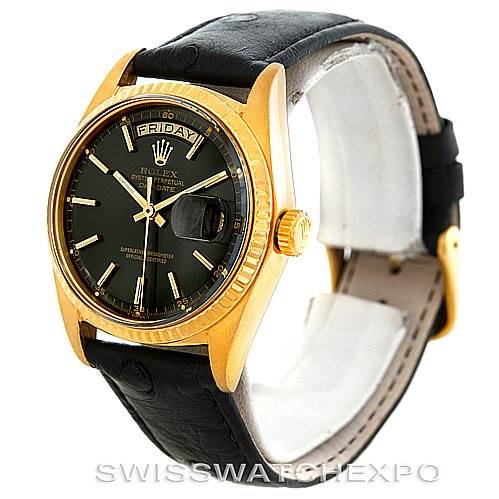 The image shows a Rolex President 1803 Men's Yellow Gold Grey Dial 1803 Men's Yellow Gold Grey Dial model watch with a gold case, black dial, black leather strap, and a partially visible crown and clasp.