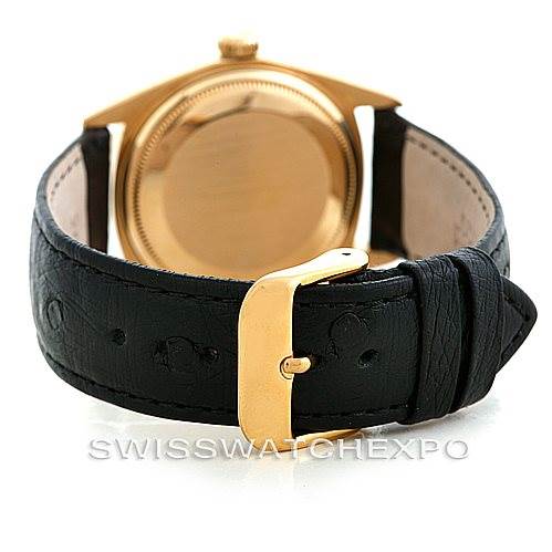 The image shows the back view of a Rolex President 1803 Men's Yellow Gold Grey Dial 1803 Men's Yellow Gold Grey Dial model watch, focusing on the watch case, leather strap, and buckle.