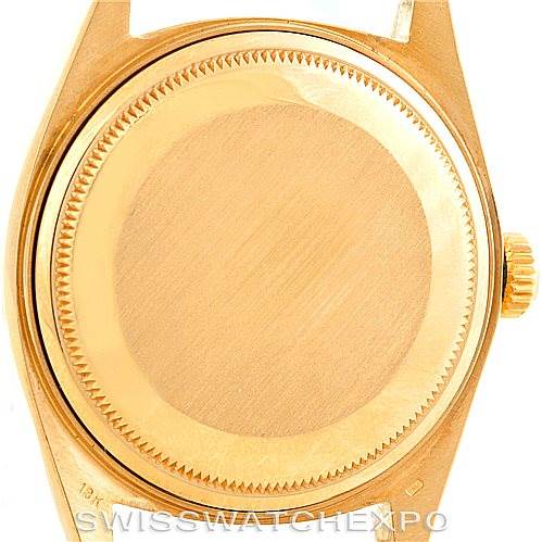 This image shows the case back and crown of a Rolex President 1803 Men's Yellow Gold Grey Dial 1803 Men's Yellow Gold Grey Dial model watch.