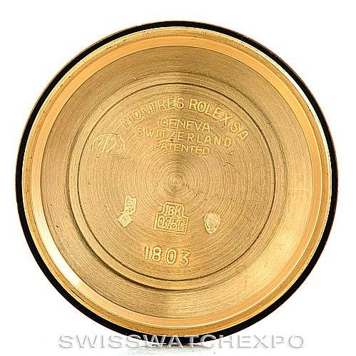 This image shows the inside of the back case of a Rolex President 1803 Men's Yellow Gold Grey Dial 1803 Men's Yellow Gold Grey Dial model watch, with engravings indicating the brand and model number.