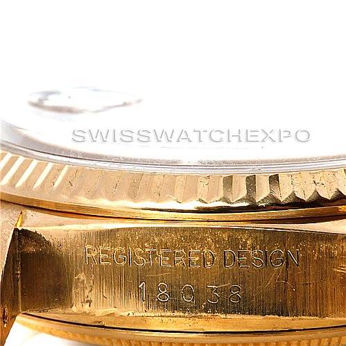 This close-up image of a Rolex President 18038 Men's Yellow Gold Brown Dial 18038 Men's Yellow Gold Brown Dial watch shows the side of the case with the engraved model number "18938" and the "Registered Design" text.