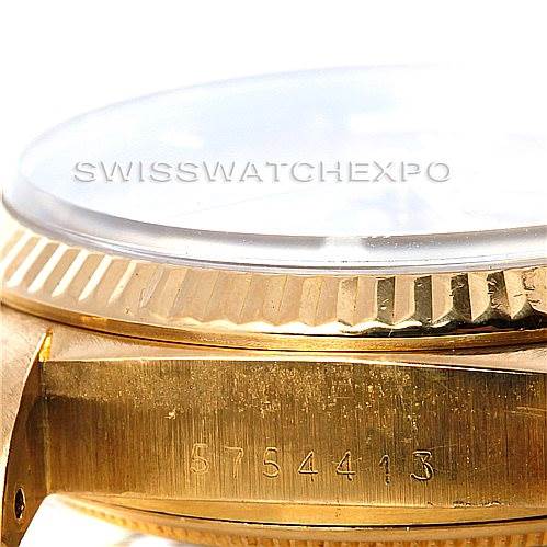 This image shows a side view of the President model Rolex watch, highlighting the bezel and case with visible serial numbers.