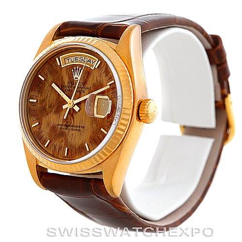 This image shows a Rolex President 18038 Men's Yellow Gold Brown Dial 18038 Men's Yellow Gold Brown Dial model watch angled to display the face, case, bezel, crown, and part of the leather strap.