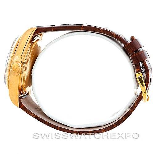 The side view of the Rolex President 18038 Men's Yellow Gold Brown Dial 18038 Men's Yellow Gold Brown Dial watch, showcasing the gold case, crown, and brown leather strap with a gold buckle.