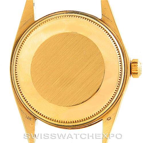 This image shows the back case and crown of the Rolex President 1512 Men
s Yellow Gold Champagne Dial 1512 Men
s Yellow Gold Champagne Dial model watch.